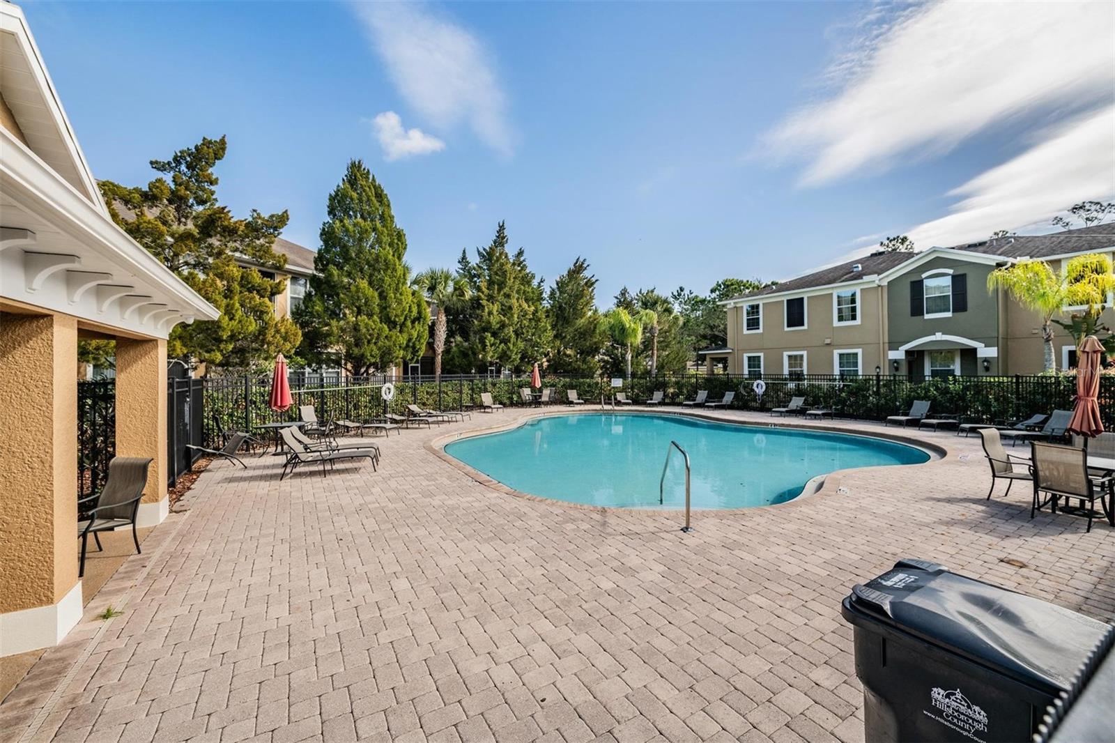 sparkling community pool just steps away from the front door
