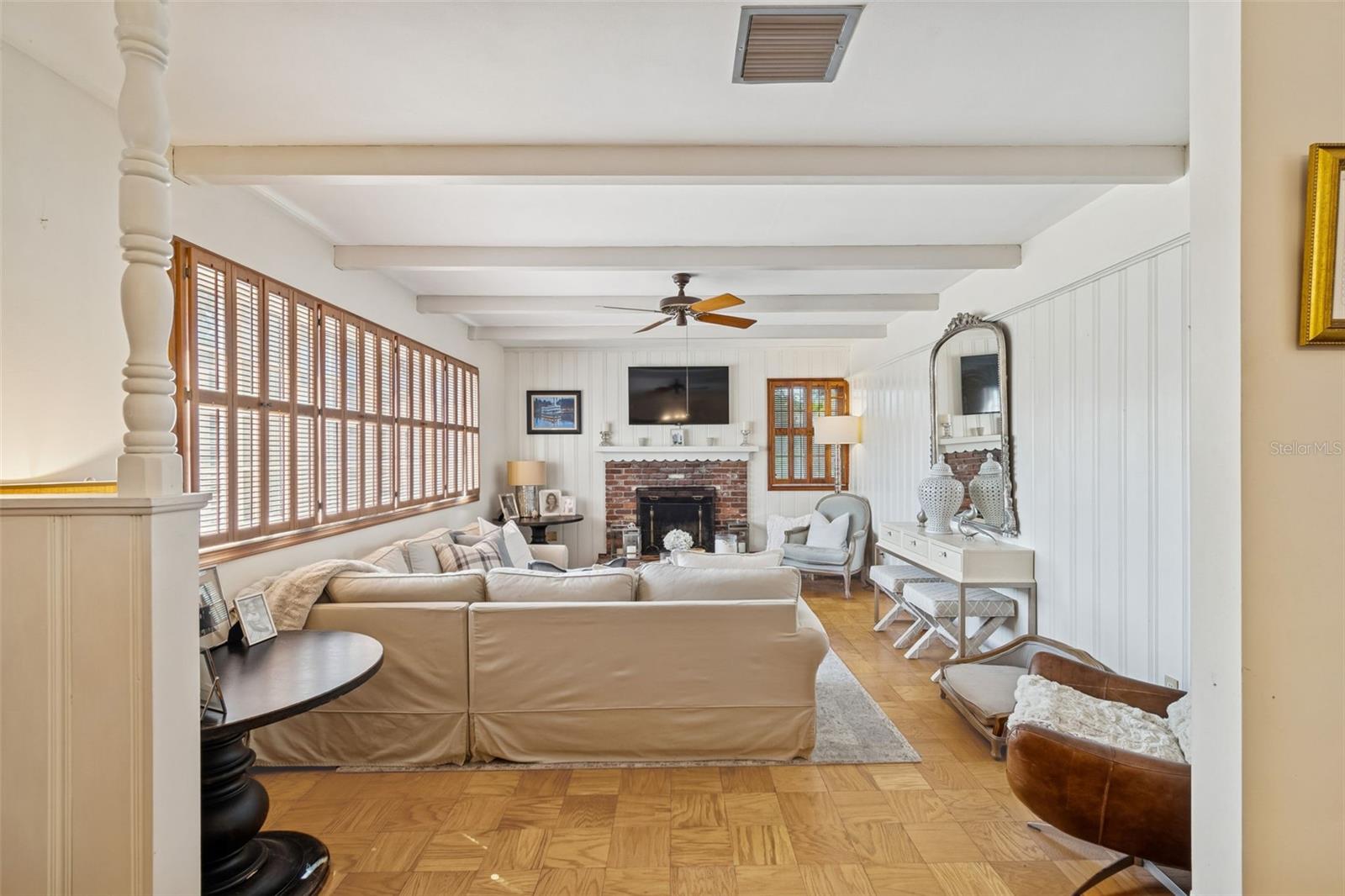 Sunken Formal Living Room w/Wood Beams & Brick Fireplace