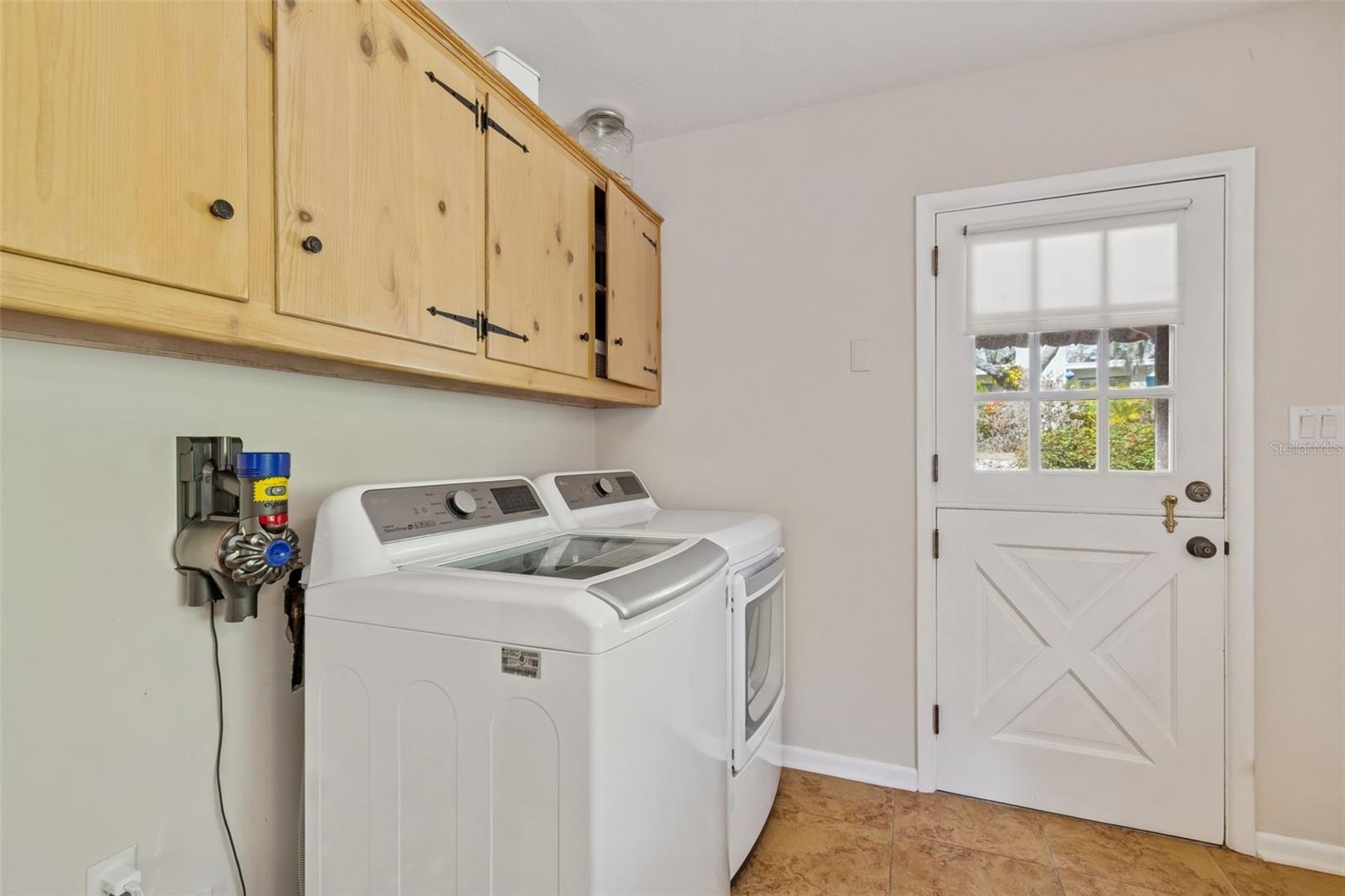 Inside Laundry Area w/Storage Cabinets
