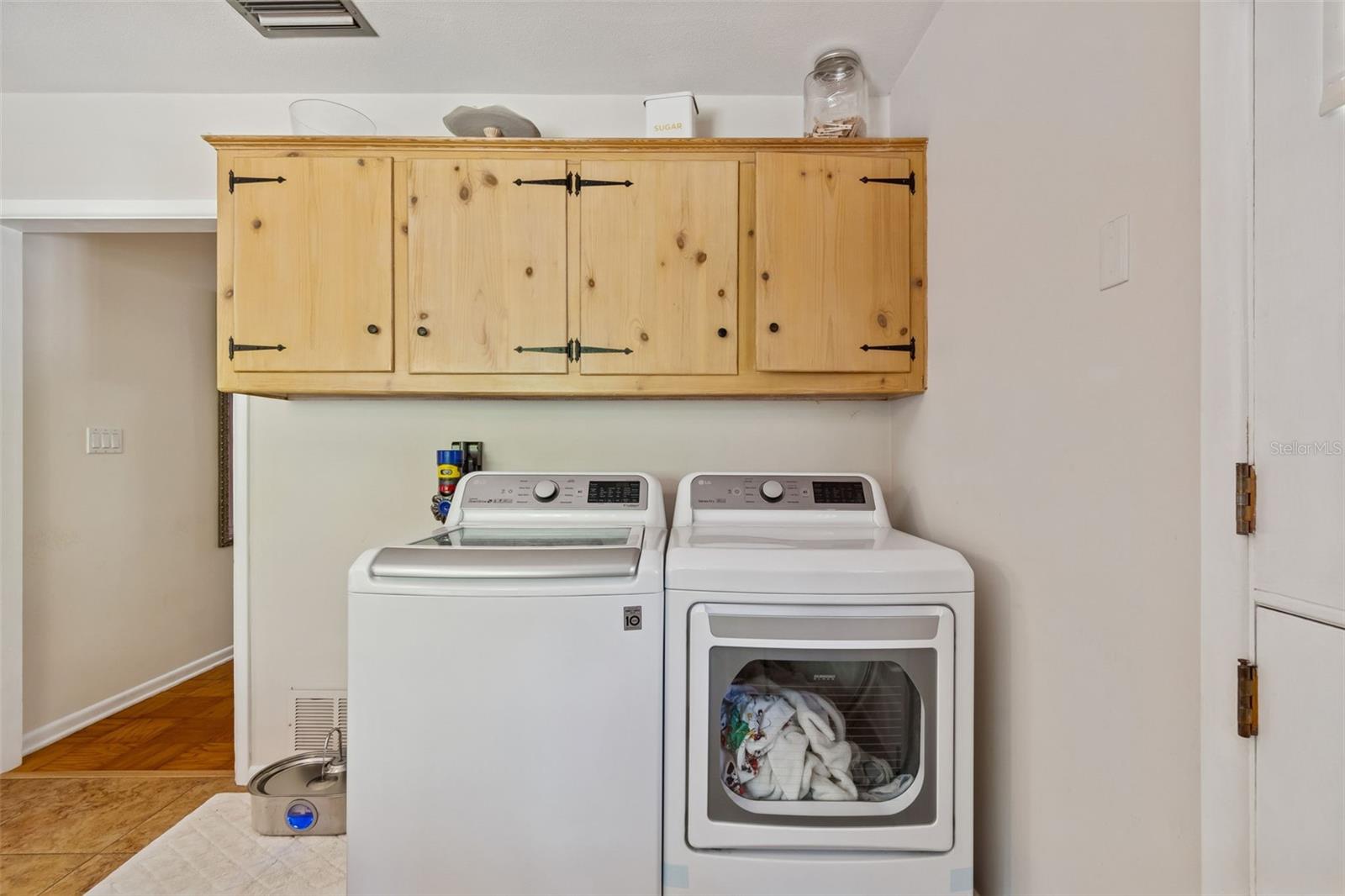 Inside Laundry Area w/Upper Cabinets