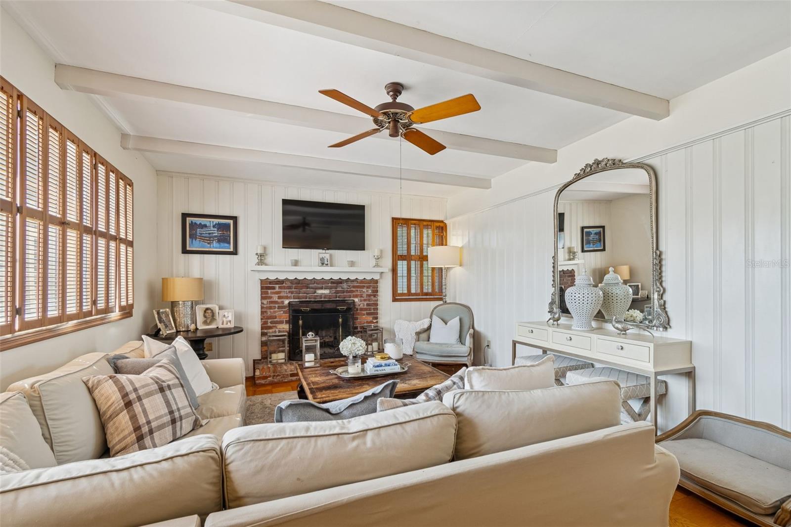 Formal Living Room w/Wood Beams & Wood-burning Fireplace