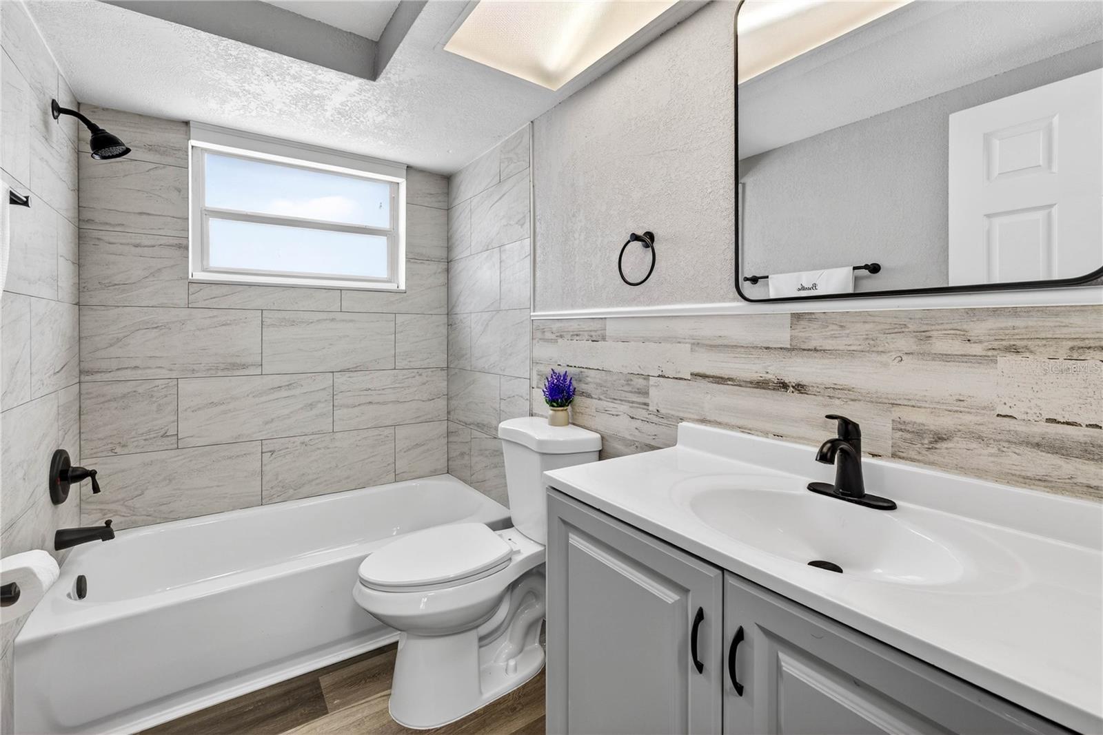 FULLY REMODELED BATHROOM #1 WITH A TUB