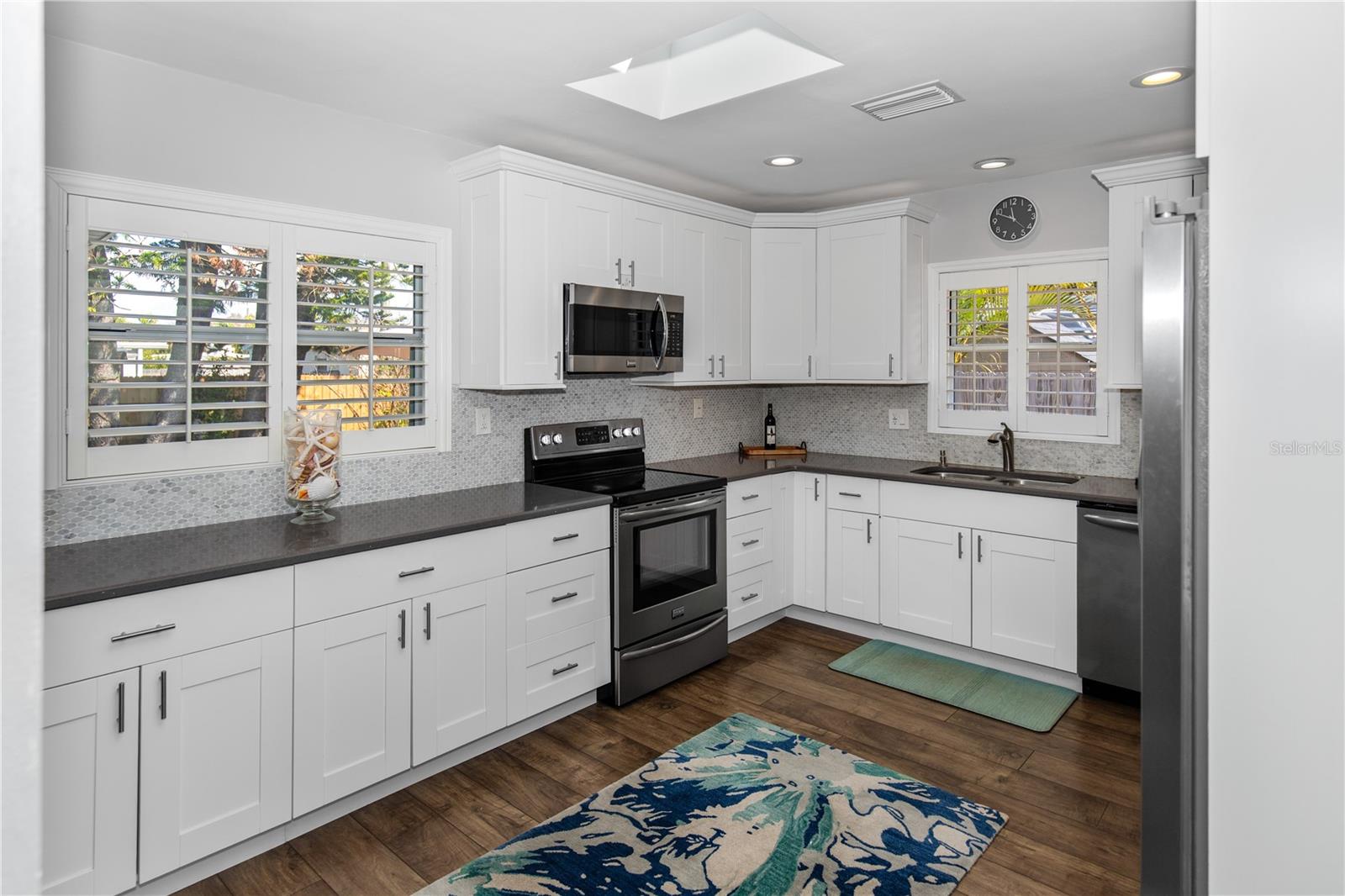 Wood cabinets and quartz countertops