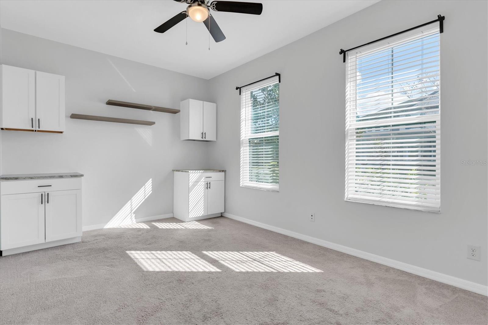 BR 3 WAS USED FOR OFFICE. CABINETS CAN BE REMOVED IF NEEDED