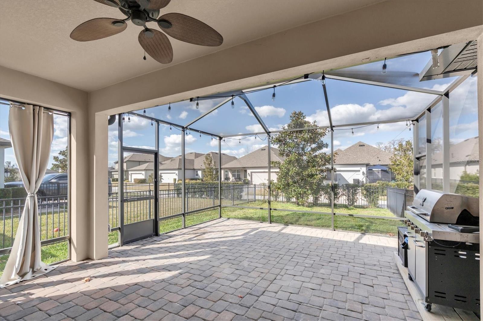 SCREENED LANAI WITH GAS GRILL