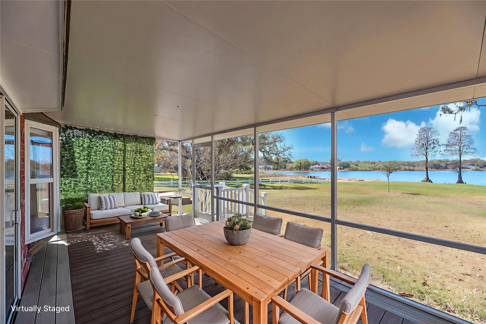 The covered, screened lanai has maintenance-free composite decking, creating seamless indoor-outdoor living.