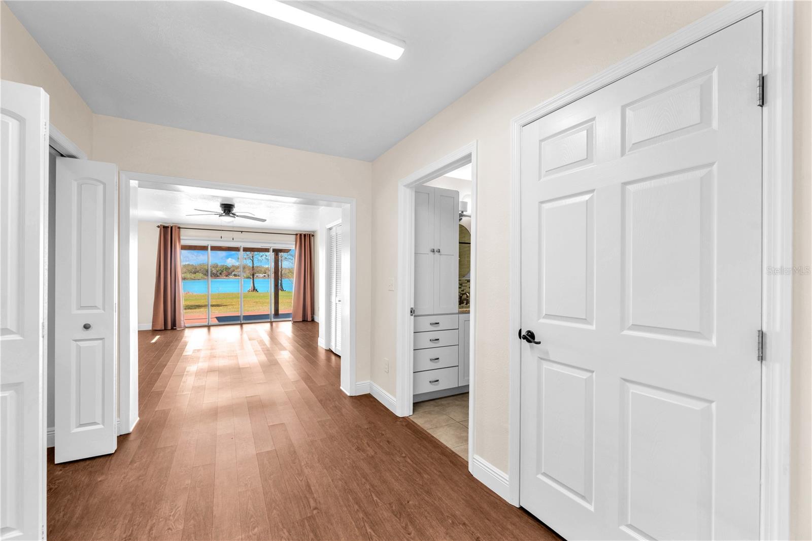 The primary suite is a spacious 15' x 19' and features a spa-like ensuite bathroom and a walk-in closet and two additional built-in closets.