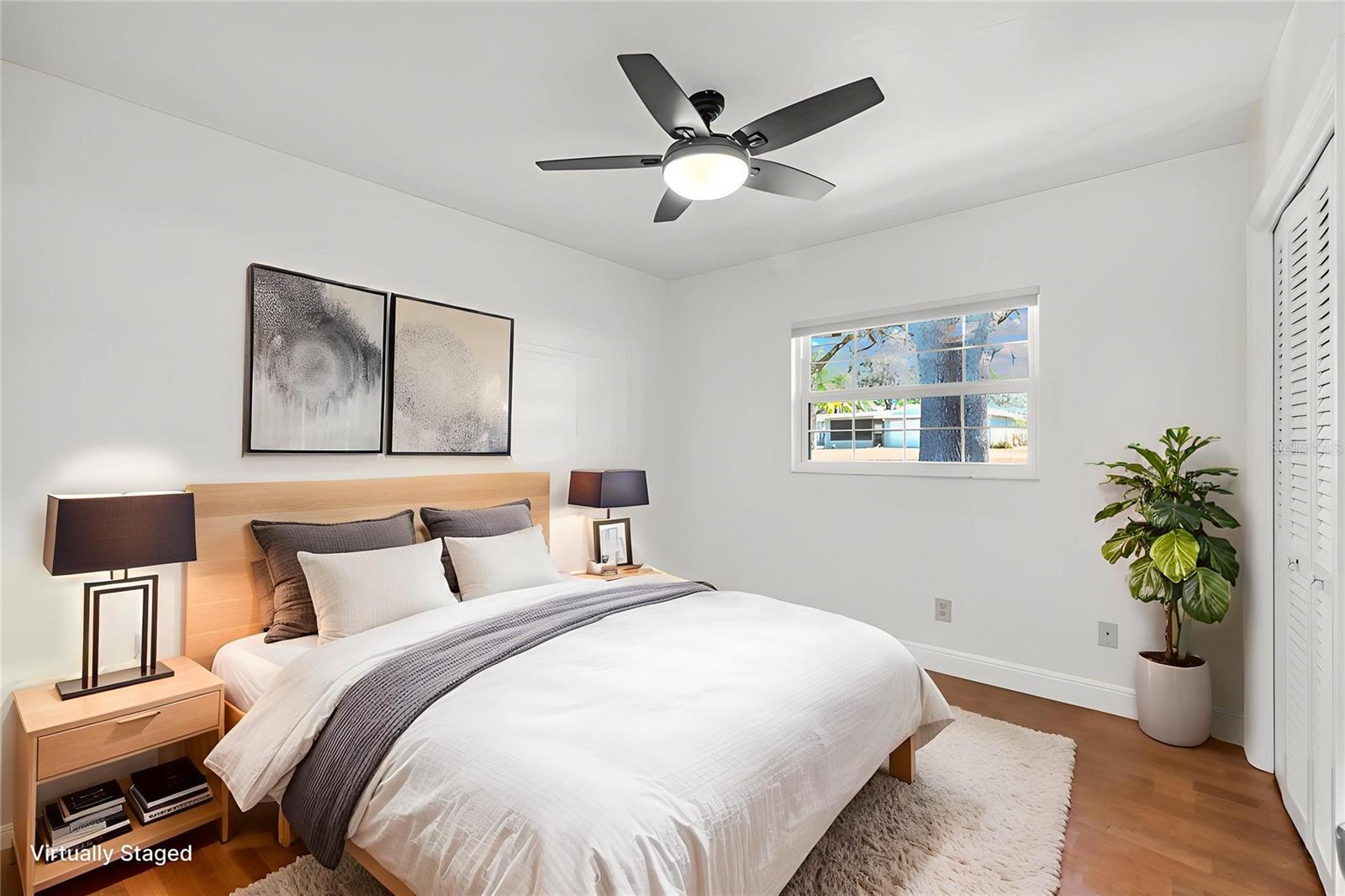 Secondary bedroom #2 is 10' x 11' with built-in closet and ceiling fan.