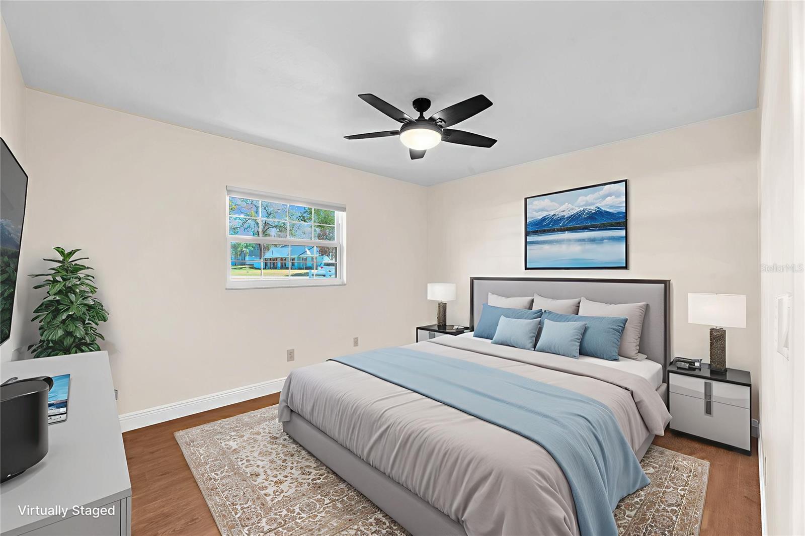 Secondary bedroom #3 is 13' x 11' with built-in closet and ceiling fan.