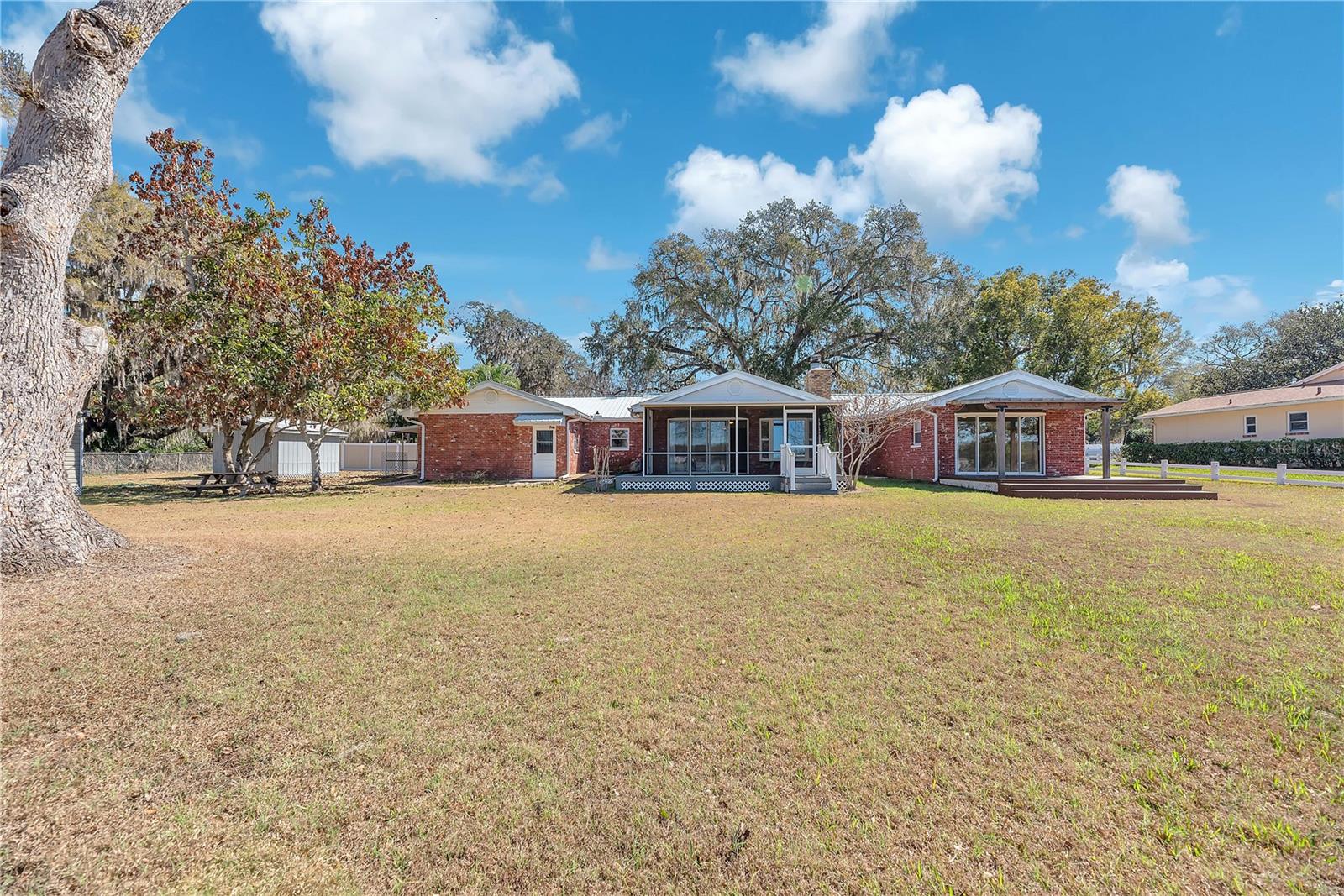 View from the back yard of the back of the home.