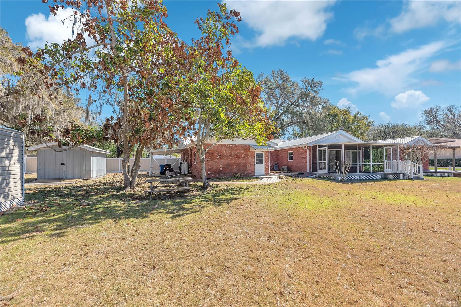 The smaller storage shed next to the carport has electric and is used to store garden and yard supplies.