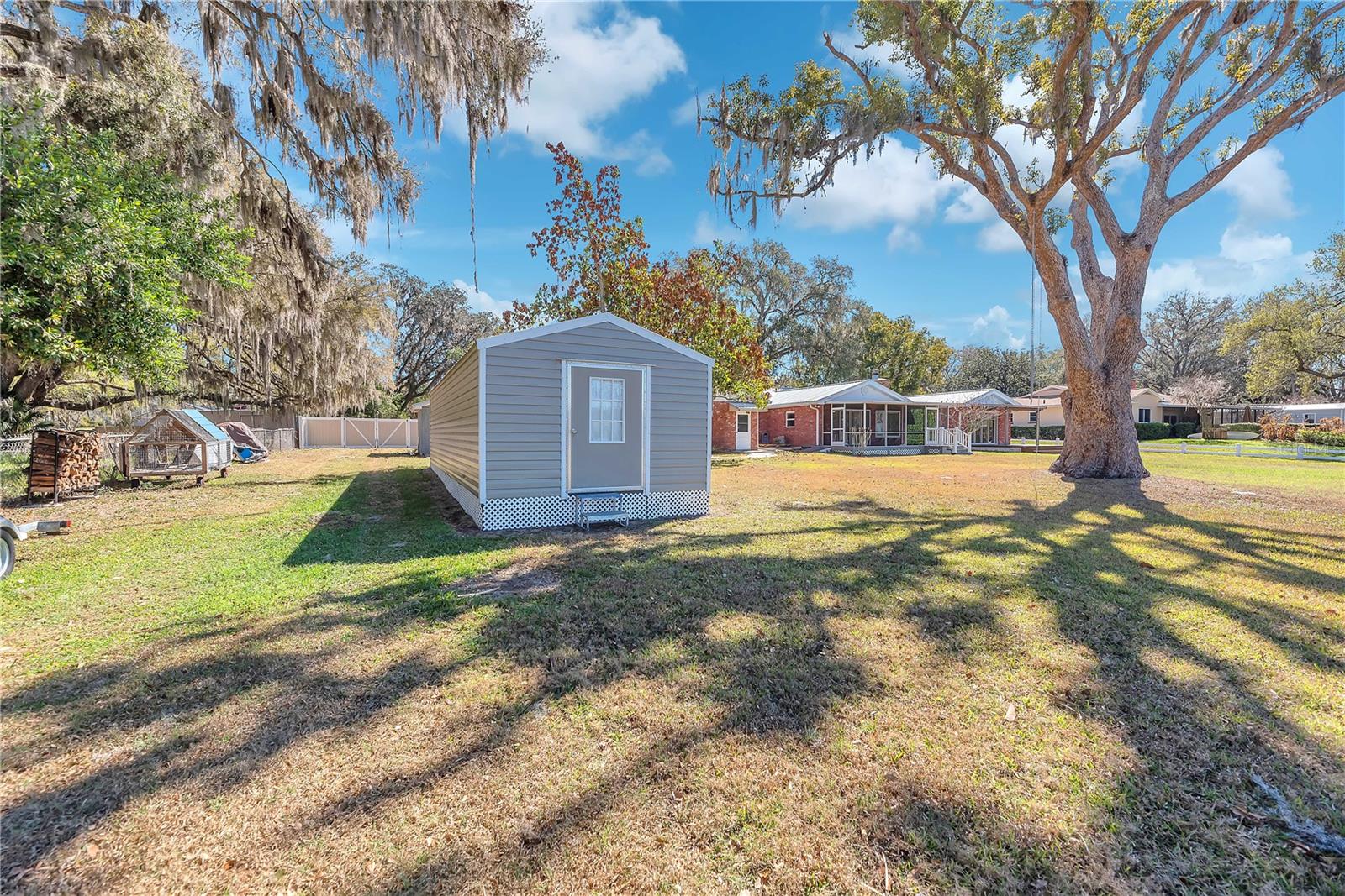 Large shed equipped with air conditioning making it ideal for a workshop, studio, home business, or secure climate-controlled storage.