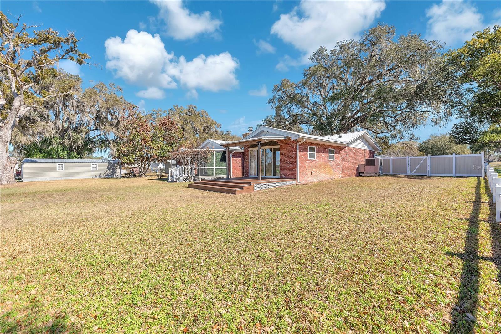 There is a single gate access in the south side fence.
