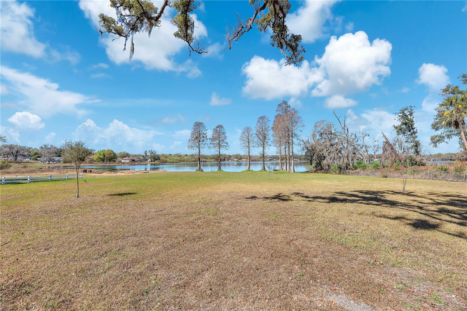 The expansive yard offers endless opportunities for owners to customize and make it their own.