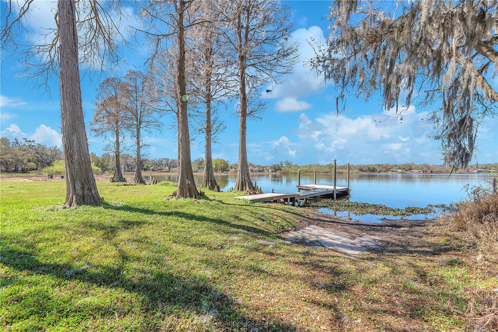 Handy gravel boat ramp for convenient trailer access for a boat or jet skis.