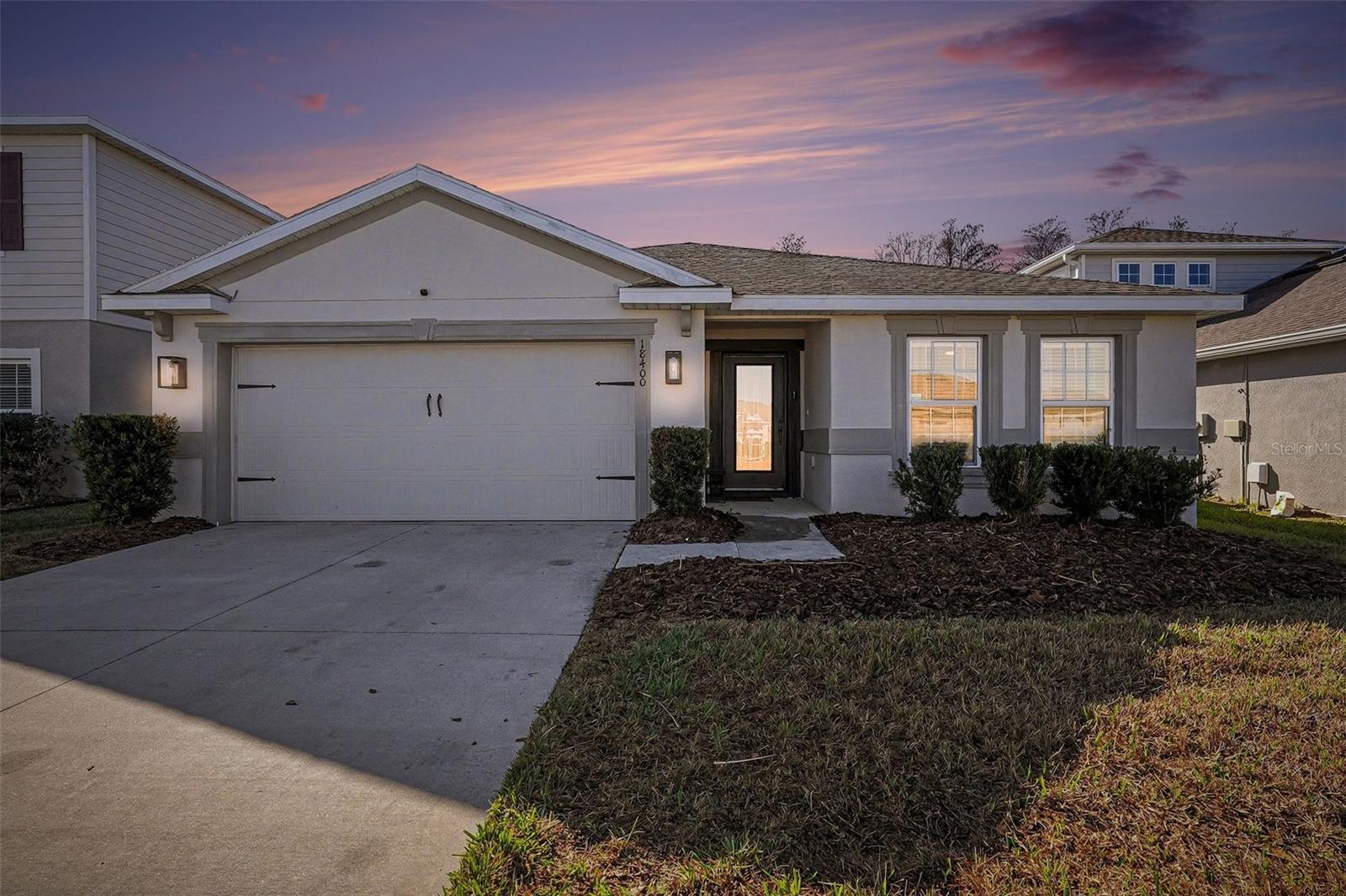 Twilight Front View - 18400 Hunters Meadow Walk, Land O Lakes, FL 34638