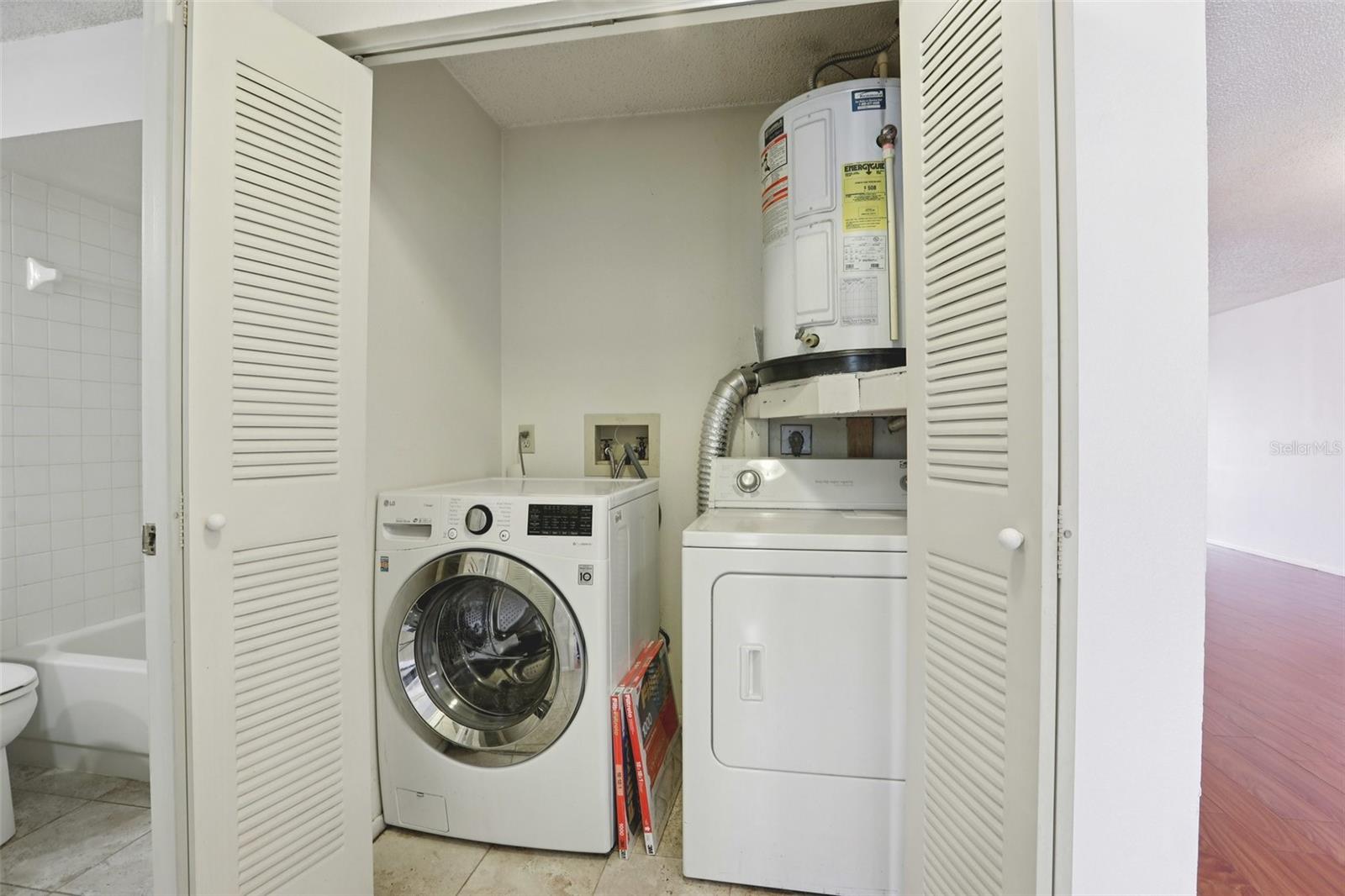 Utility closet with washer and dryer