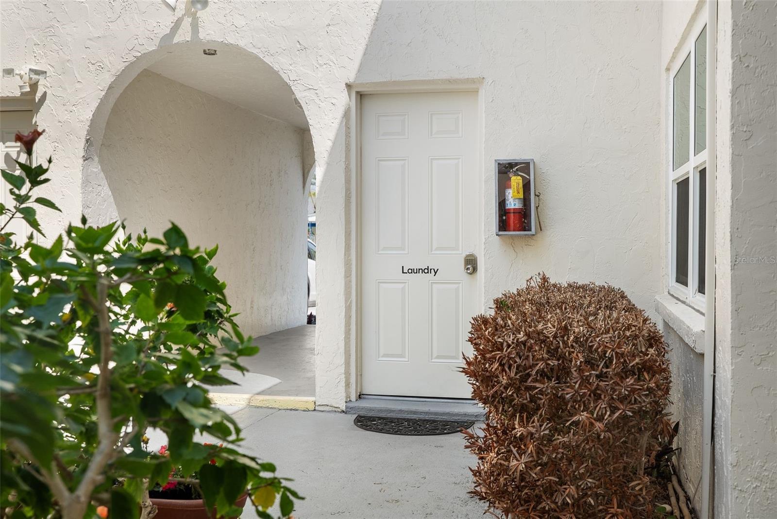 Laundry room just under unit on ground floor