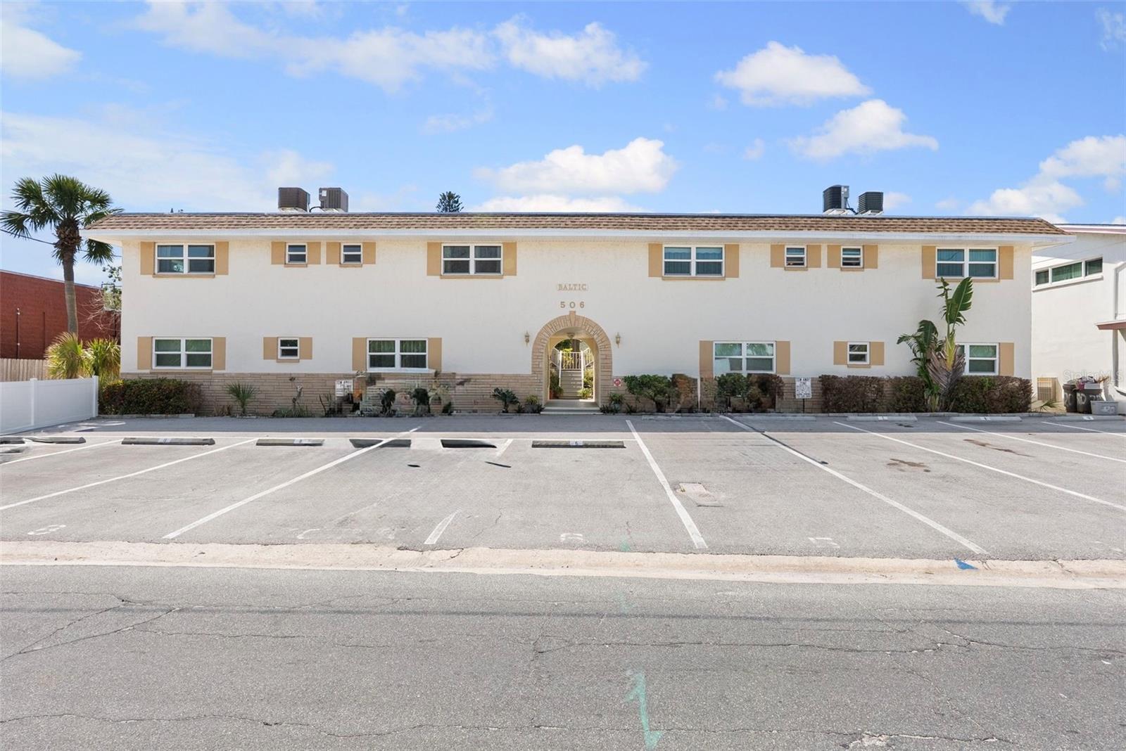 Unit comes with tandem parking for 2 cars with additional guest parking on the side of the building