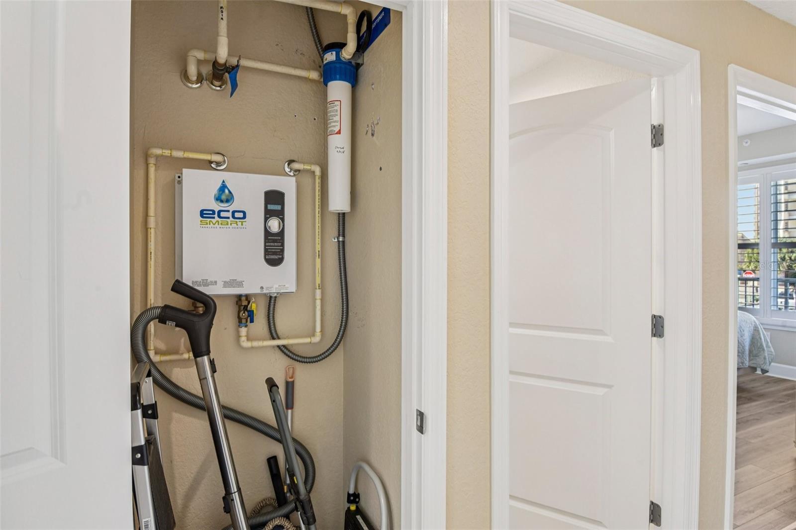 Tankless Hot Water Heater Closet.
