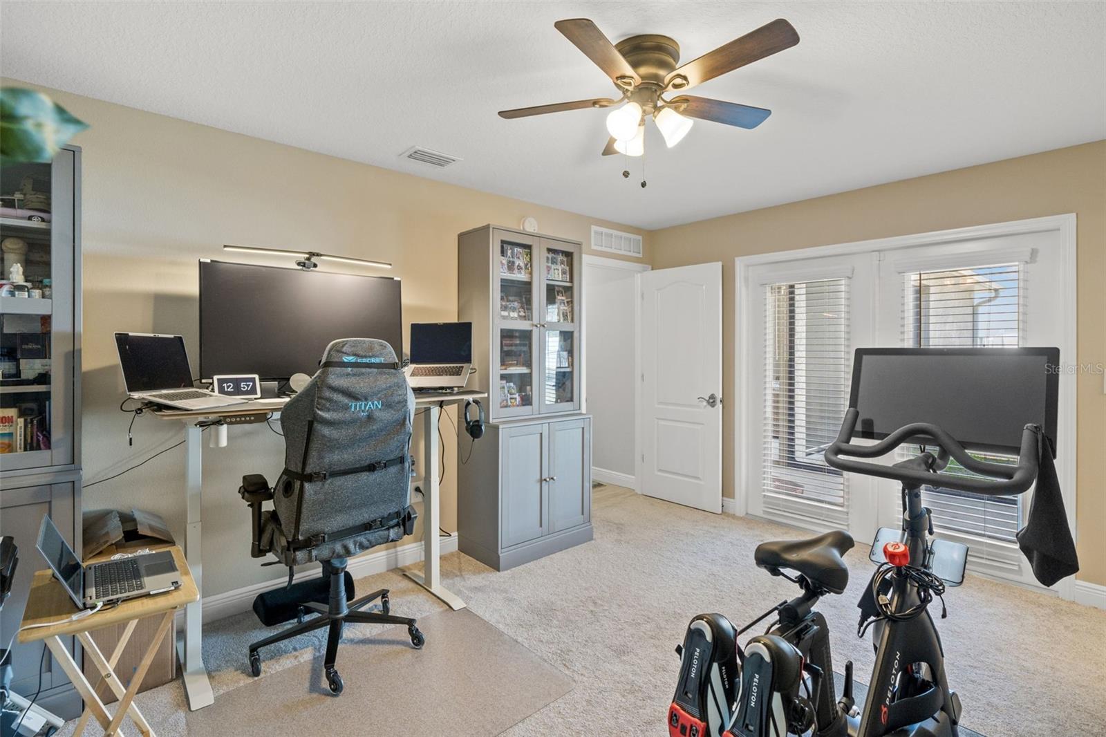 Bedroom 2 with ensuite bathroom and walk-in closet & porch access