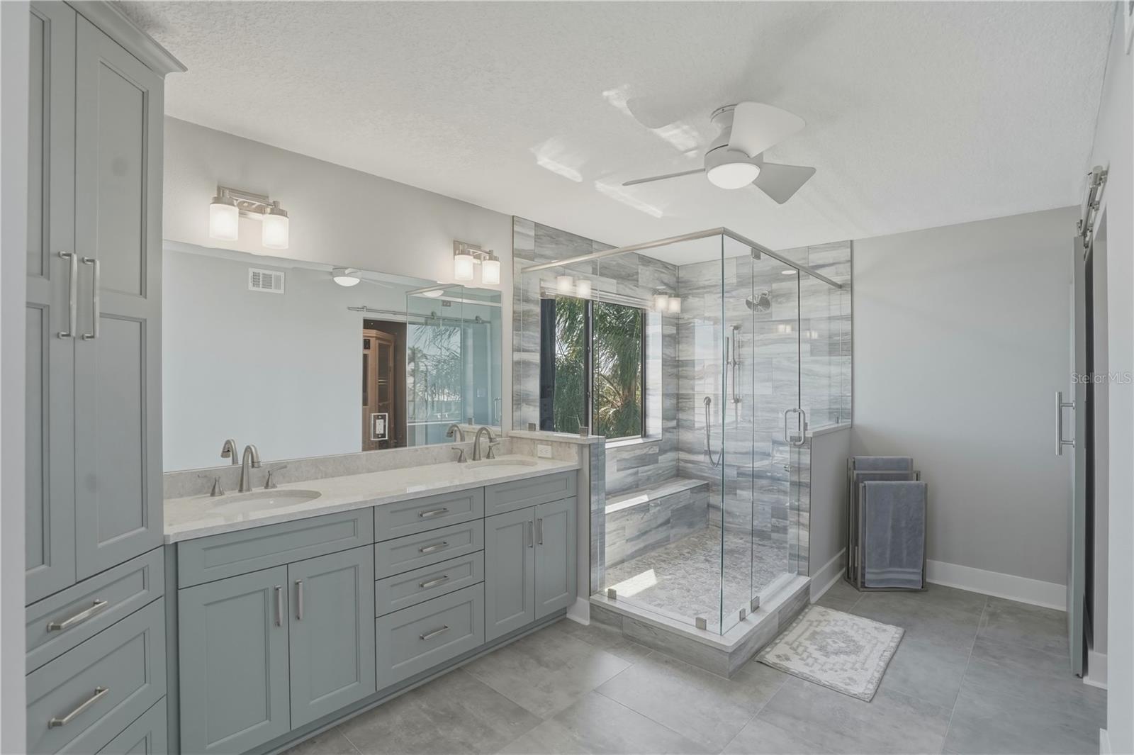 primary suite spa bath with sauna