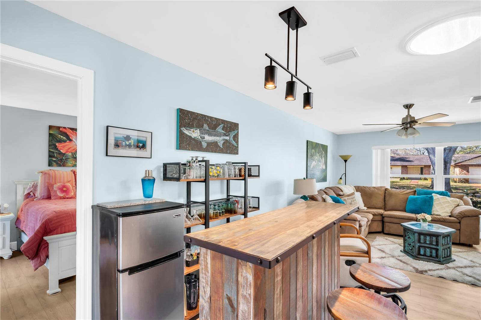 The master bedroom - split plan - is accessed off the dining room area ~