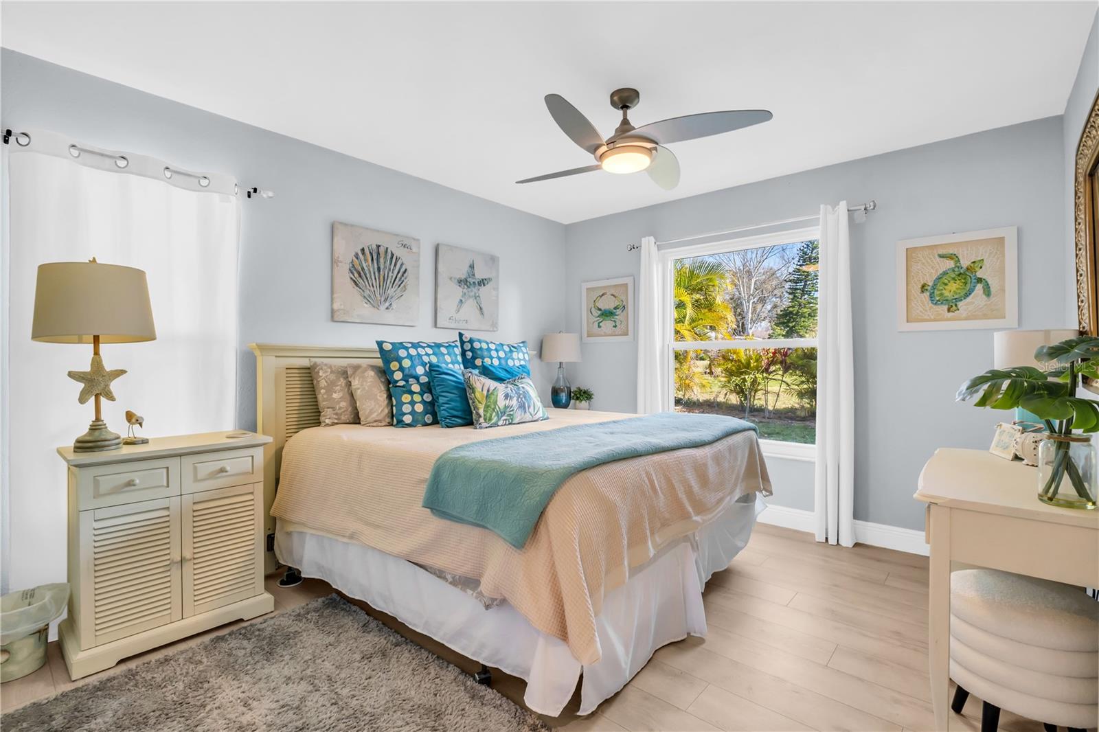 Your second bedroom offers its own relaxing area and backyard view ~