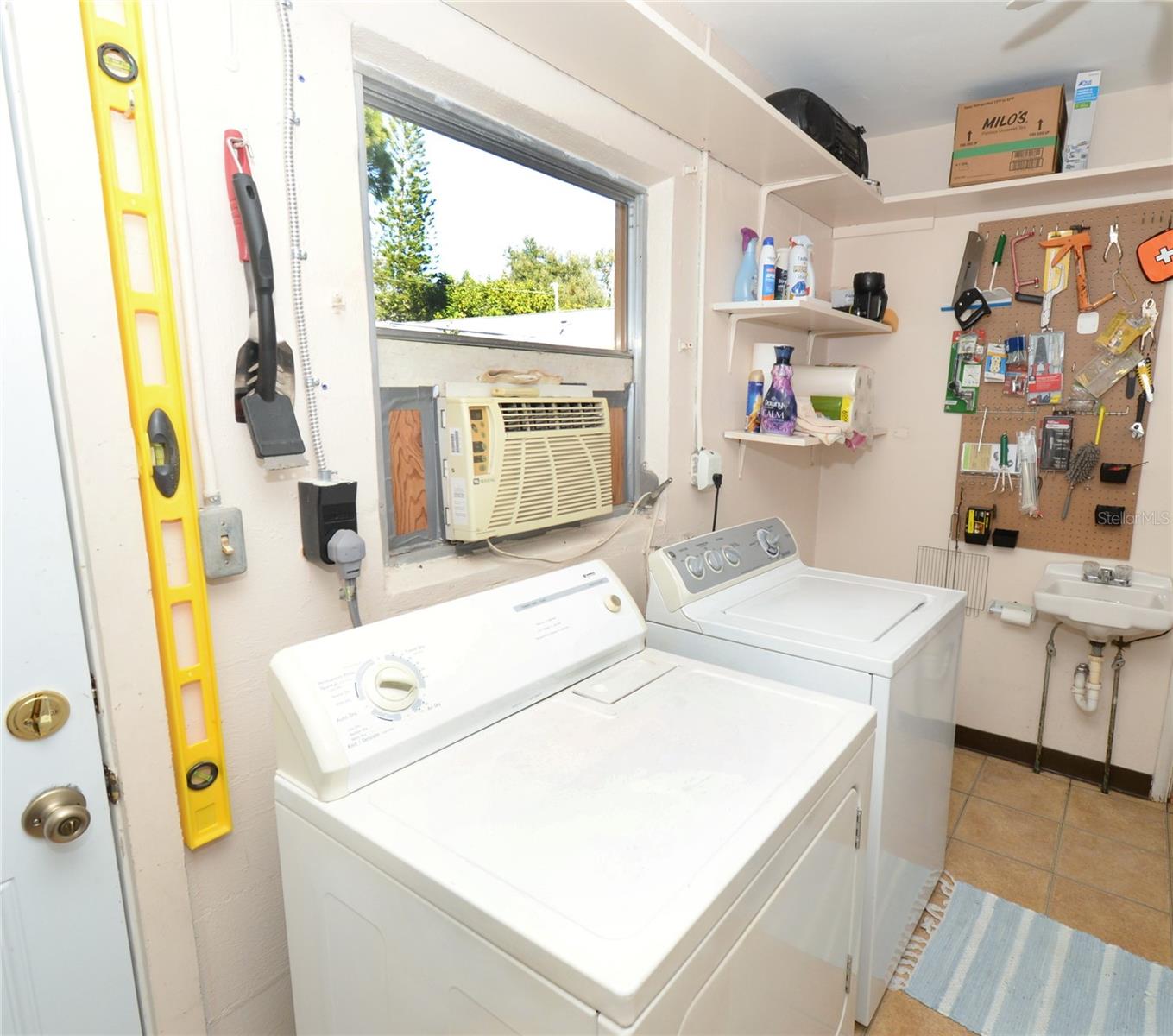 Utility room and half bath washer and dryer convey