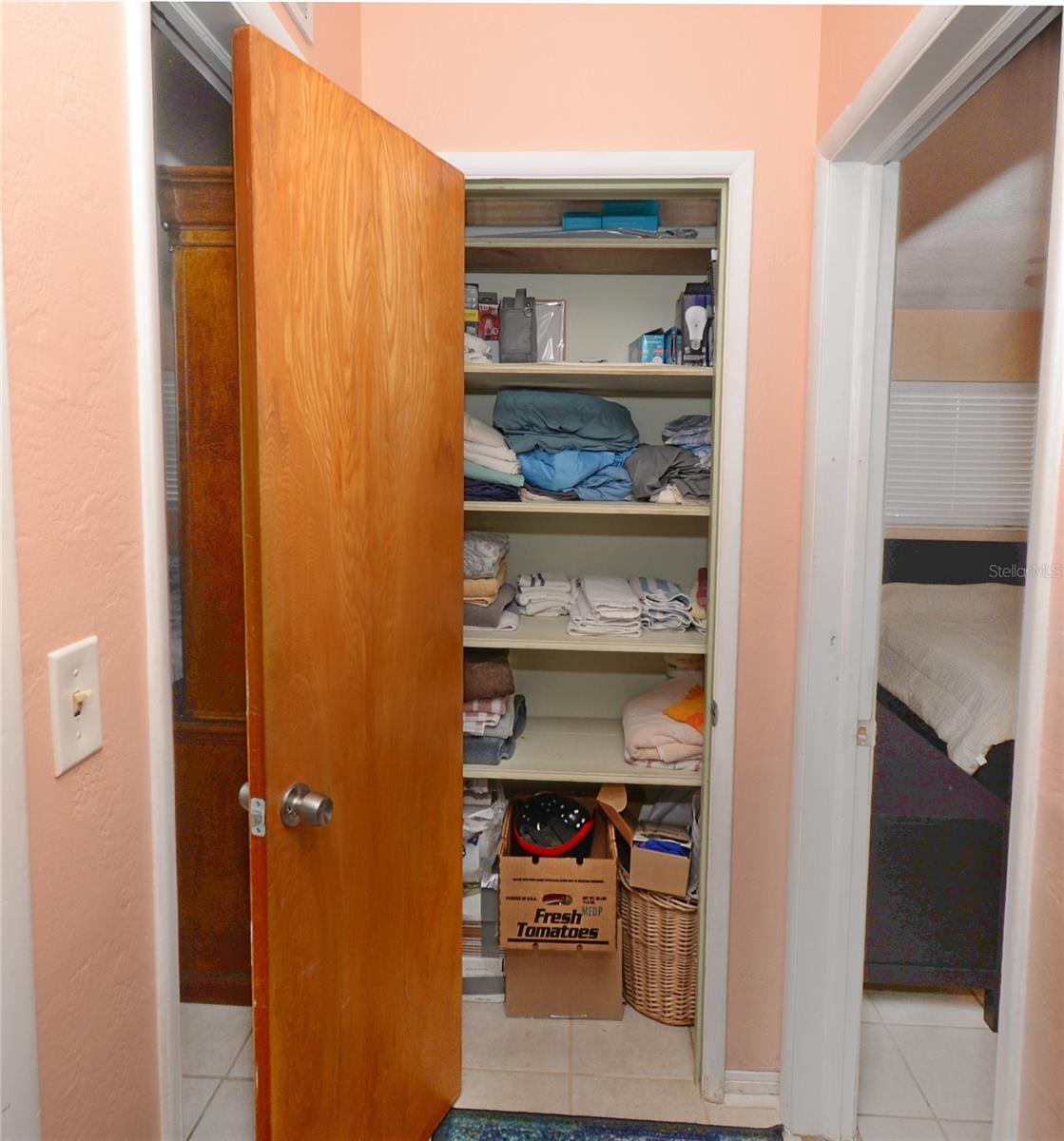 Large linen closet in hallway