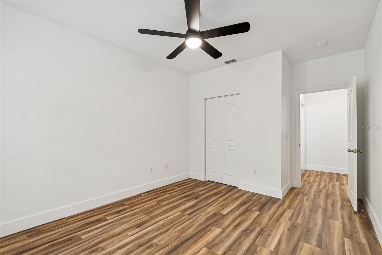 Guest bedroom with walk in closet