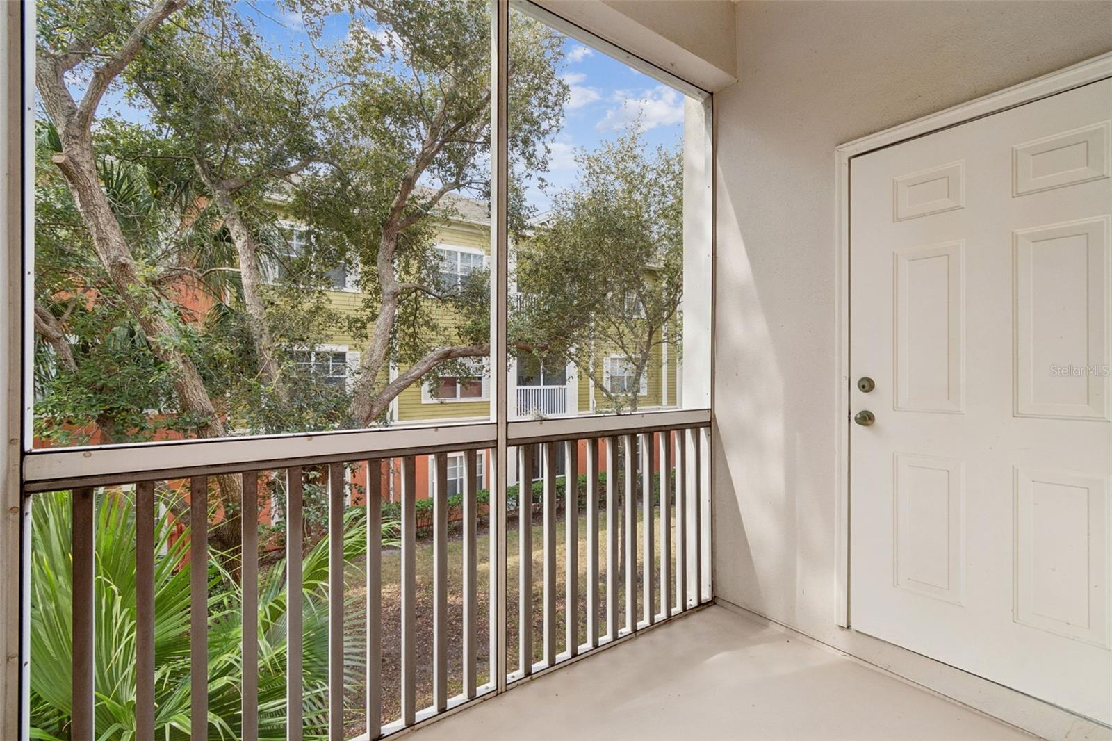 screened balcony with storage closet