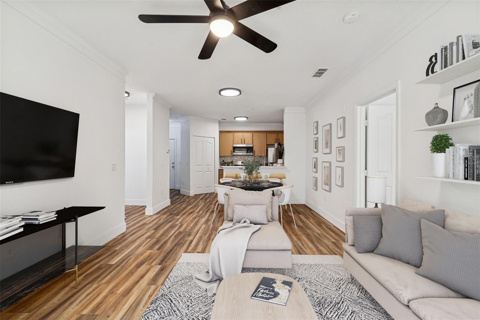 Living Room looking at front door, virtually staged