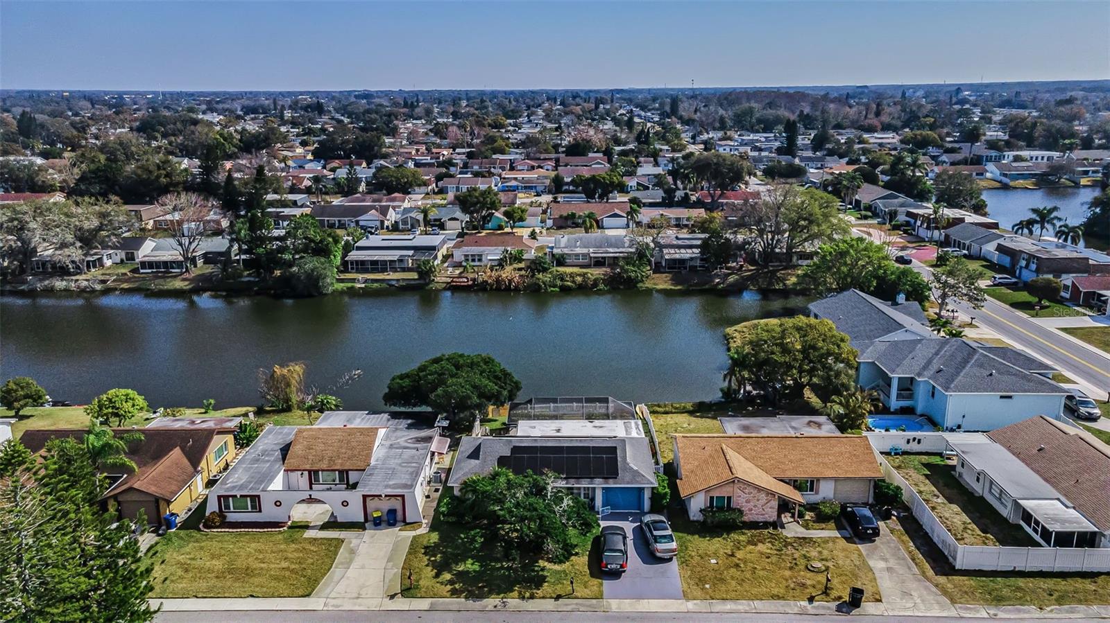 Aerial showing home and water view