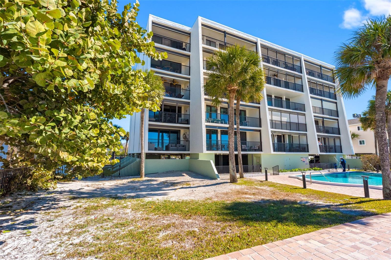 ... TOP FLOOR CORNER UNT 505... UNDER BUILDING PARKING SPACE # LUCKY 8 - PLUS STORAGE BIN  IN GARAGE FOR BEACH EQUIPMENT.