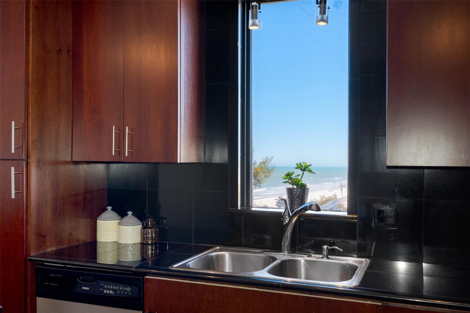 .. SOLID WOOD CABINETRY.. KITCHEN WAS REMODELED  TO AN OPEN FLOORPLAN .
