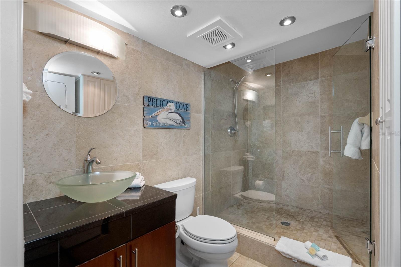 ... PROFESSIONAL TILE  WORK SHOWCASES BATHROOM .. WALK IN SHOWER- NEW TOILET  - NEW VANITY -