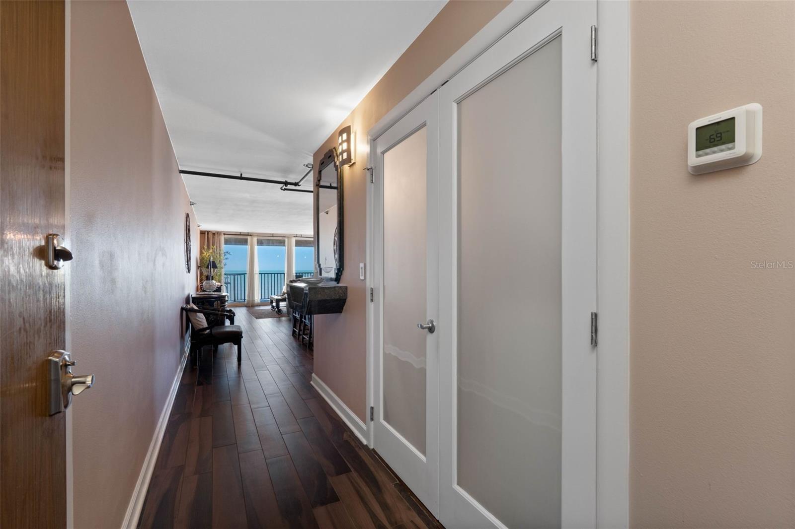 .. HALLWAY FROM BEDROOM TO LIVING AREAS.. BEAUTIFUL UNIT - ALL WORK COMPLETED..