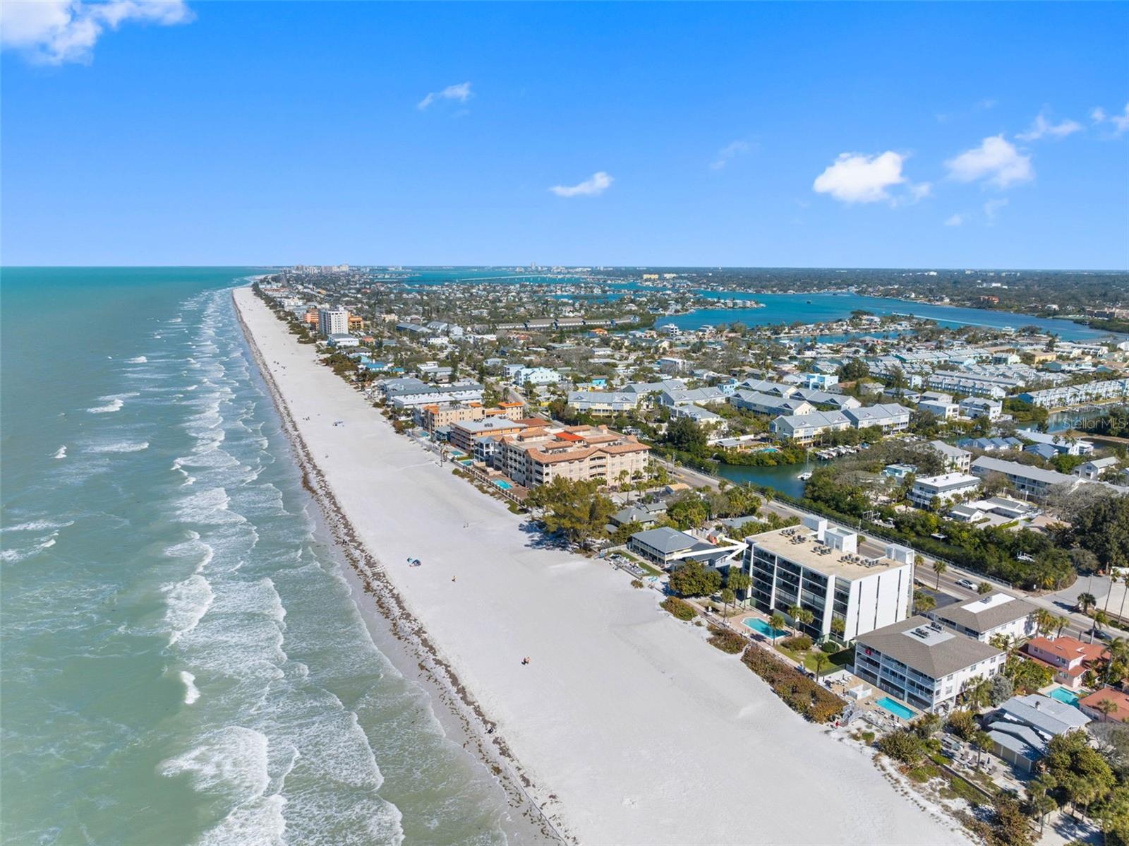 .. BEACH VIEW LOOKING NORTH FROM 506 GULF BLVD.. ENJOY LONG RANGE GULF AND BEACH VIEWS FROM YOUR BALCONY.