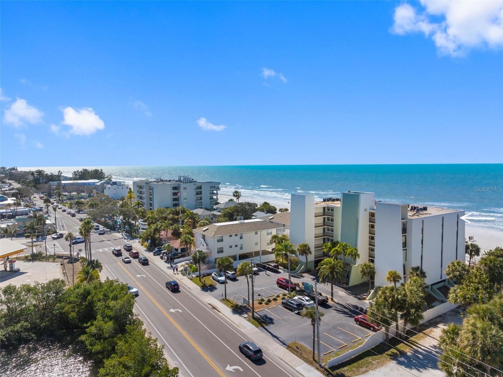 .. AERIAL LOOKING SOUTHWEST OVER PELICANS COVE..PLENTY OF GUEST PARKING. UNIT 505 ENJOYS UNDER BLDG SPOT # LUCKY 8..