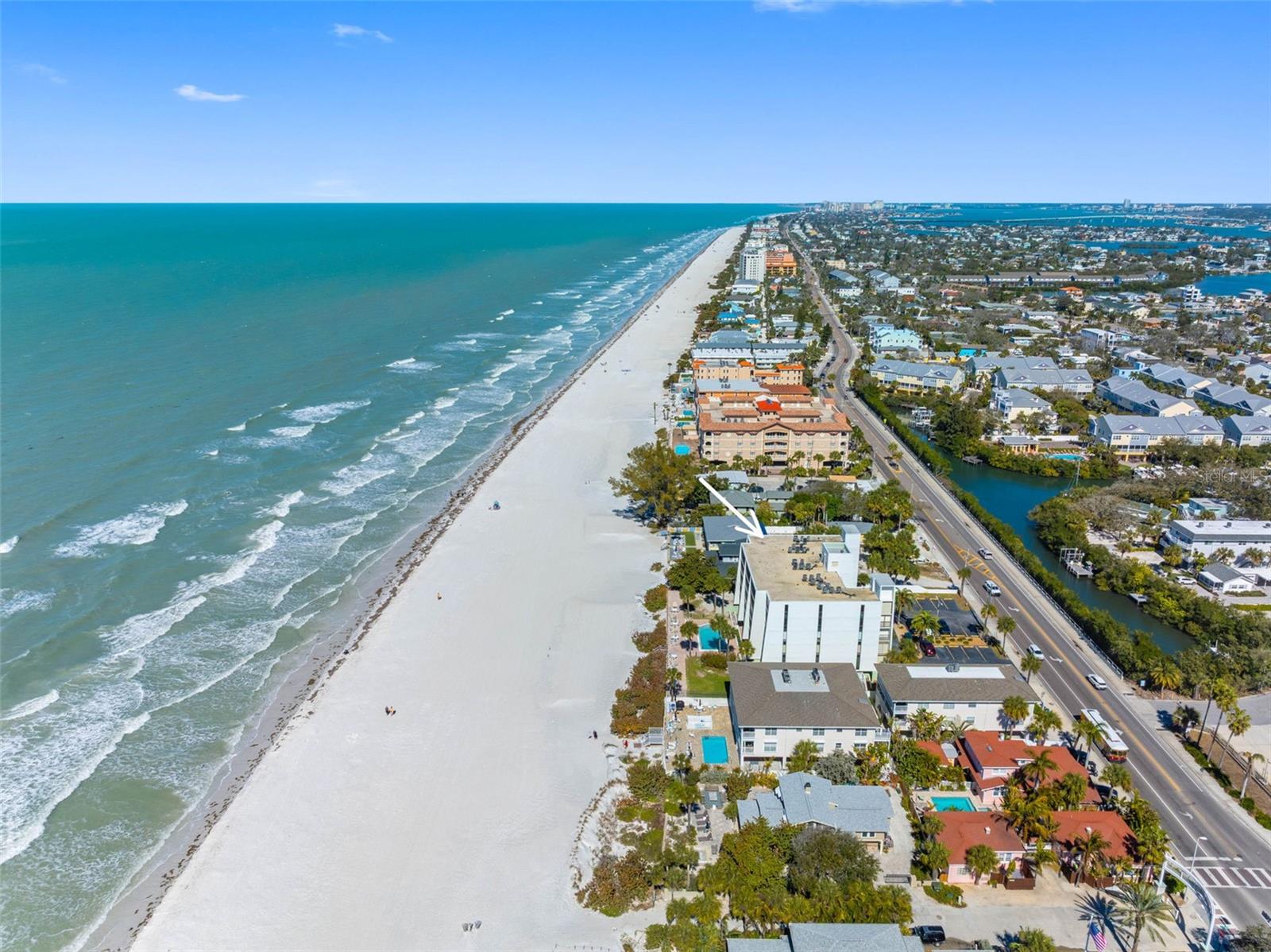 .. BEACH VIEW LOOKING NORTH FROM 506 GULF BLVD..COMPLEX IS SET BACK FROM GULF BLVD - NO STREET NOISE FROM UNIT.