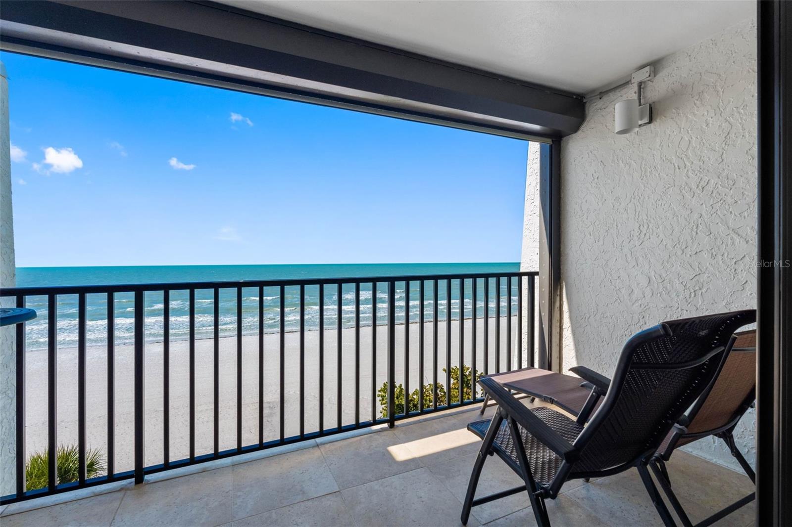 .. FINISHED GULF FRONT BALCONY 14 X 7... CORNER UNT PROVIDES LONG RANGE BEACH VIEWS.