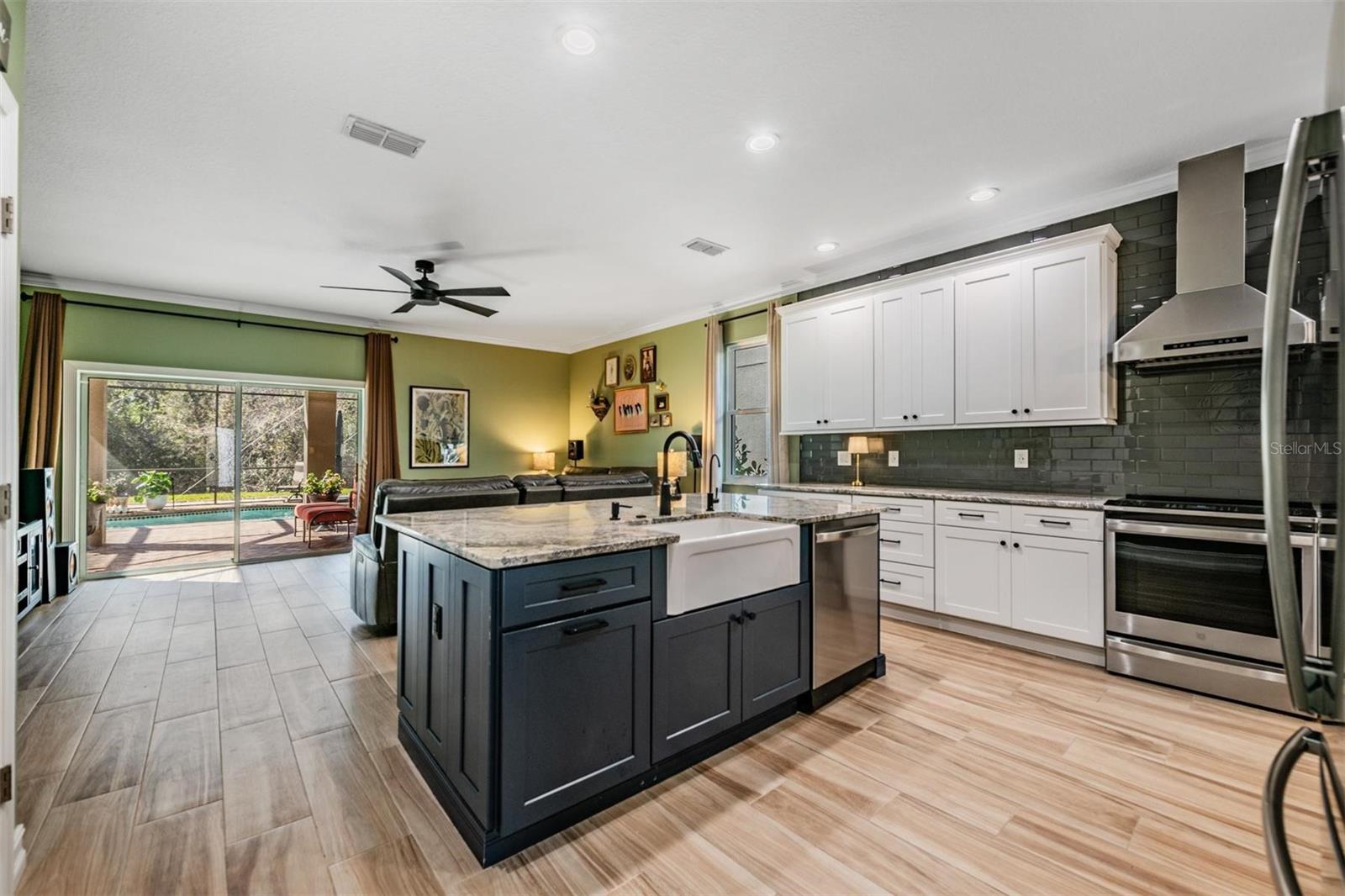 Open and airy kitchen with pool/lanai view
