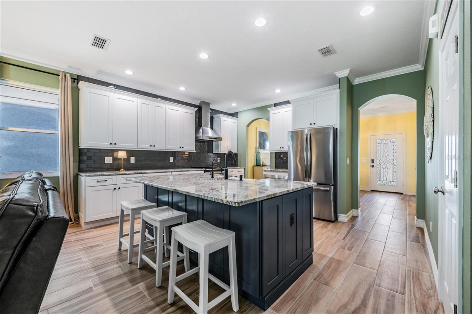 Thoughtful kitchen layout with breakfast bar seating