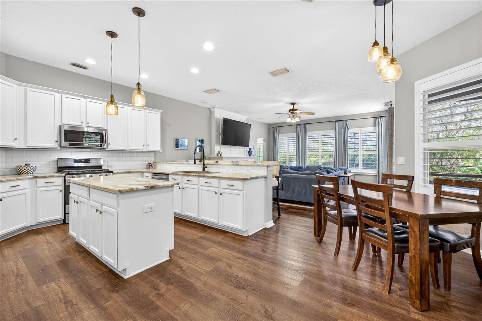 Kitchen/Living/Breakfast area anchors the heart of the home.
