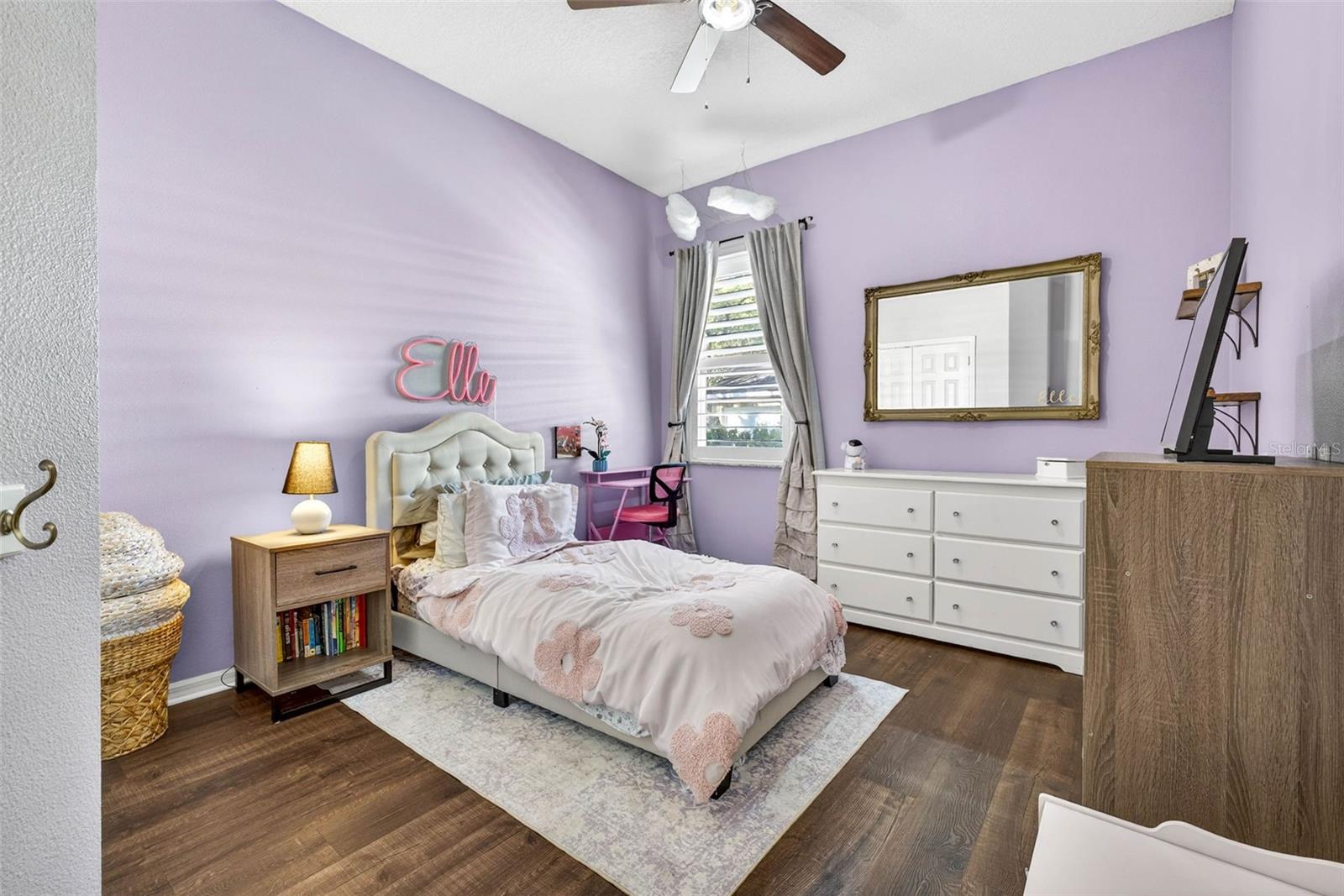 Secondary bedroom complete with ceiling fan