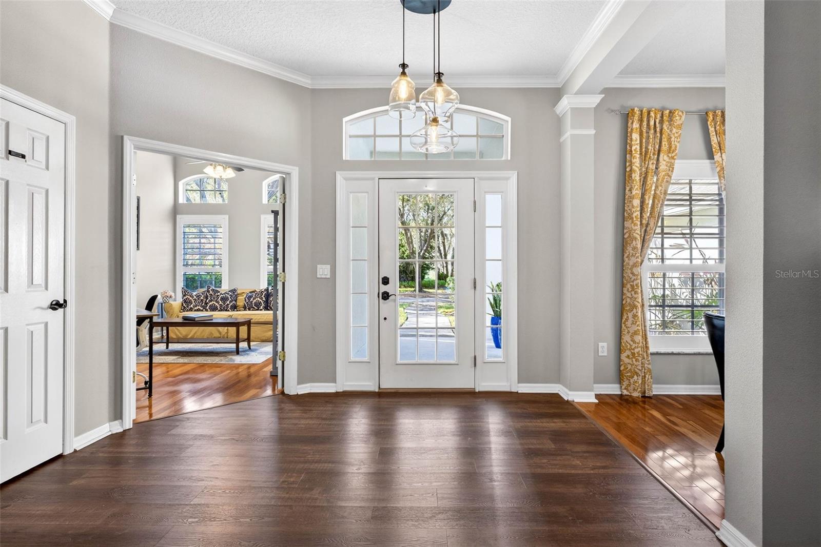 Foyer with glimpse of office and formal area