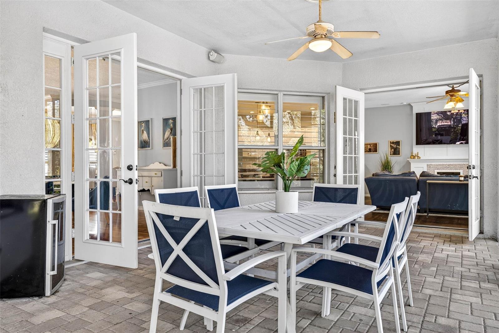 Open french doors from formal area and family room on to screened lanai.