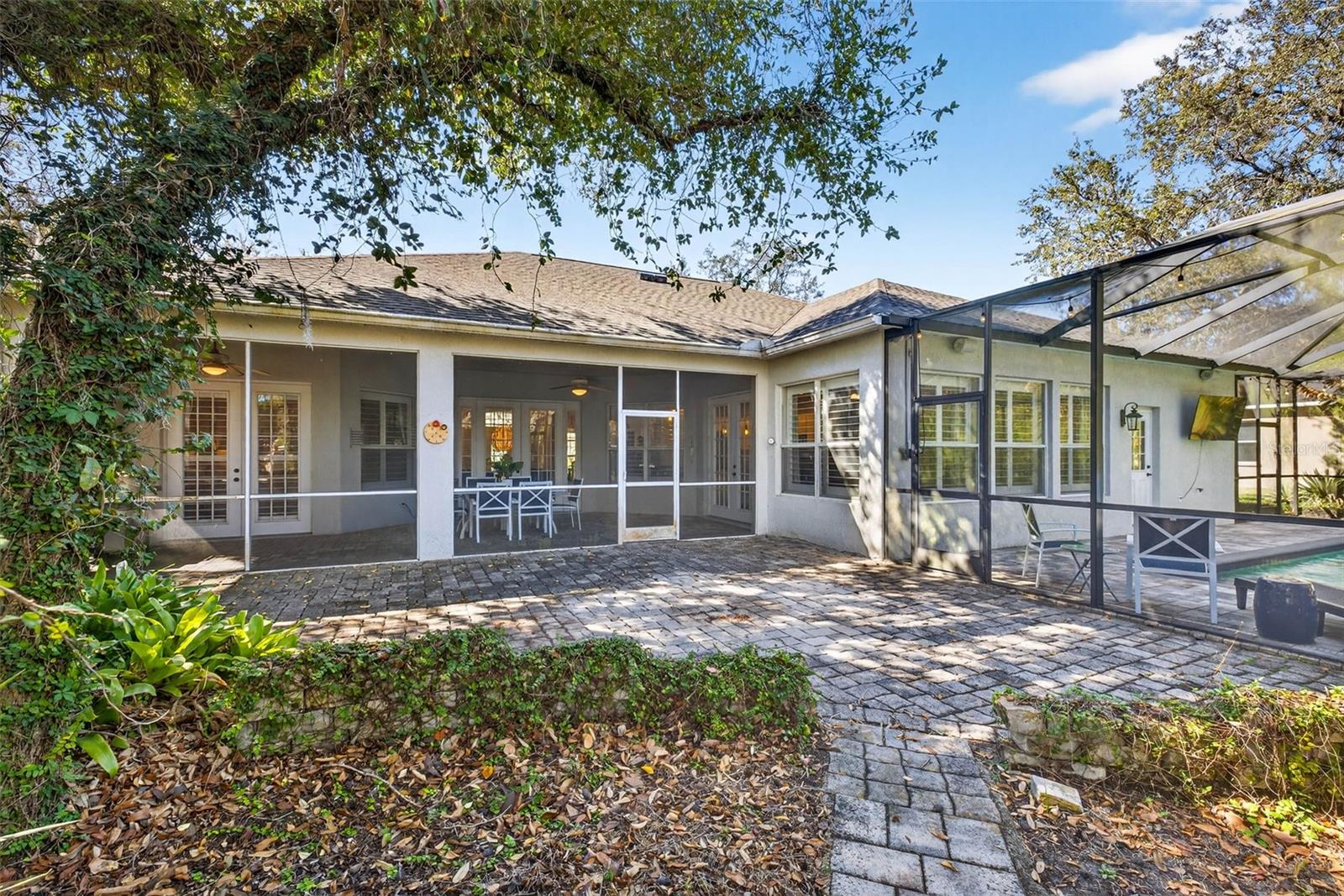 View from back of home with mature oak trees.
