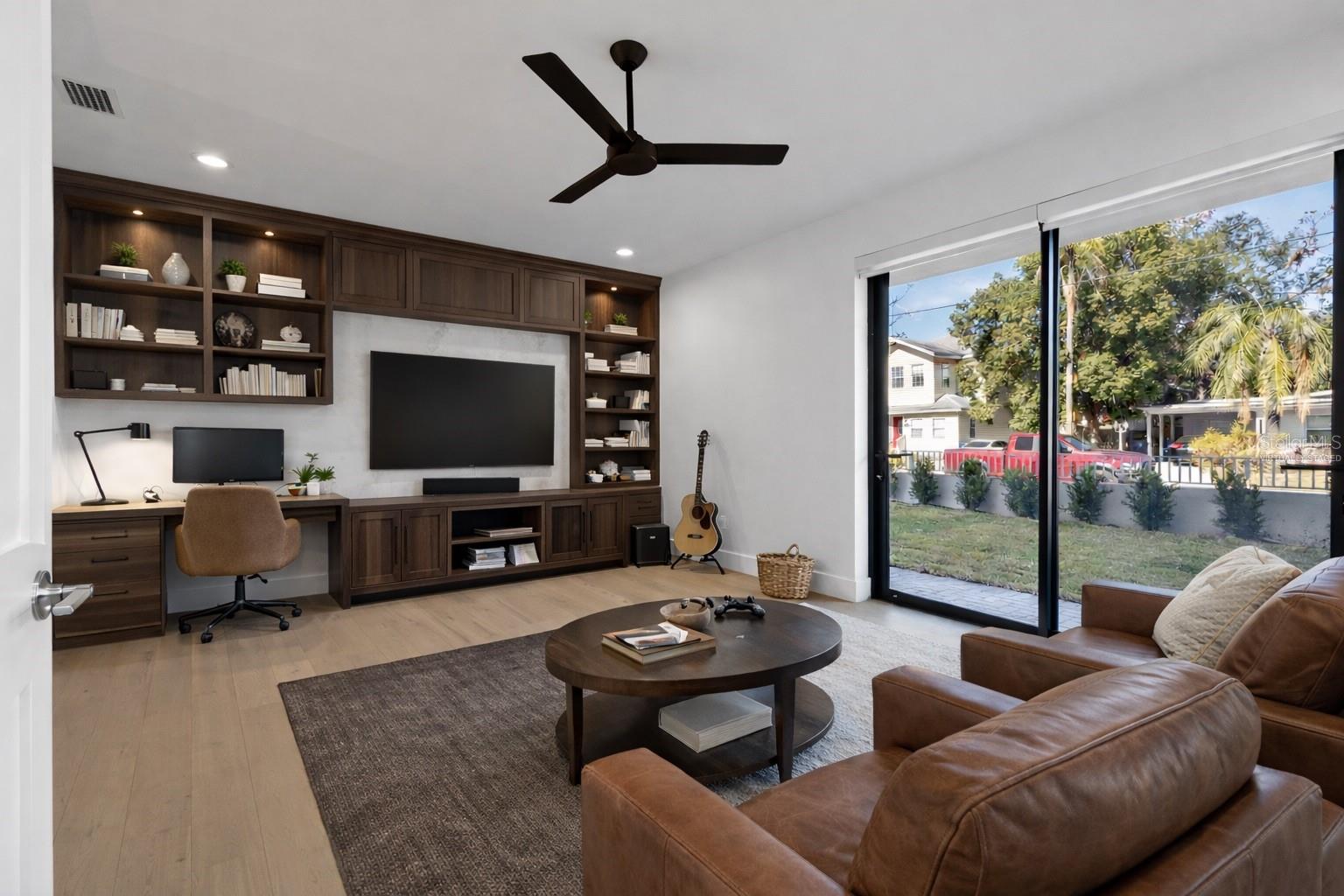 virtually staged bedroom/entertainment room